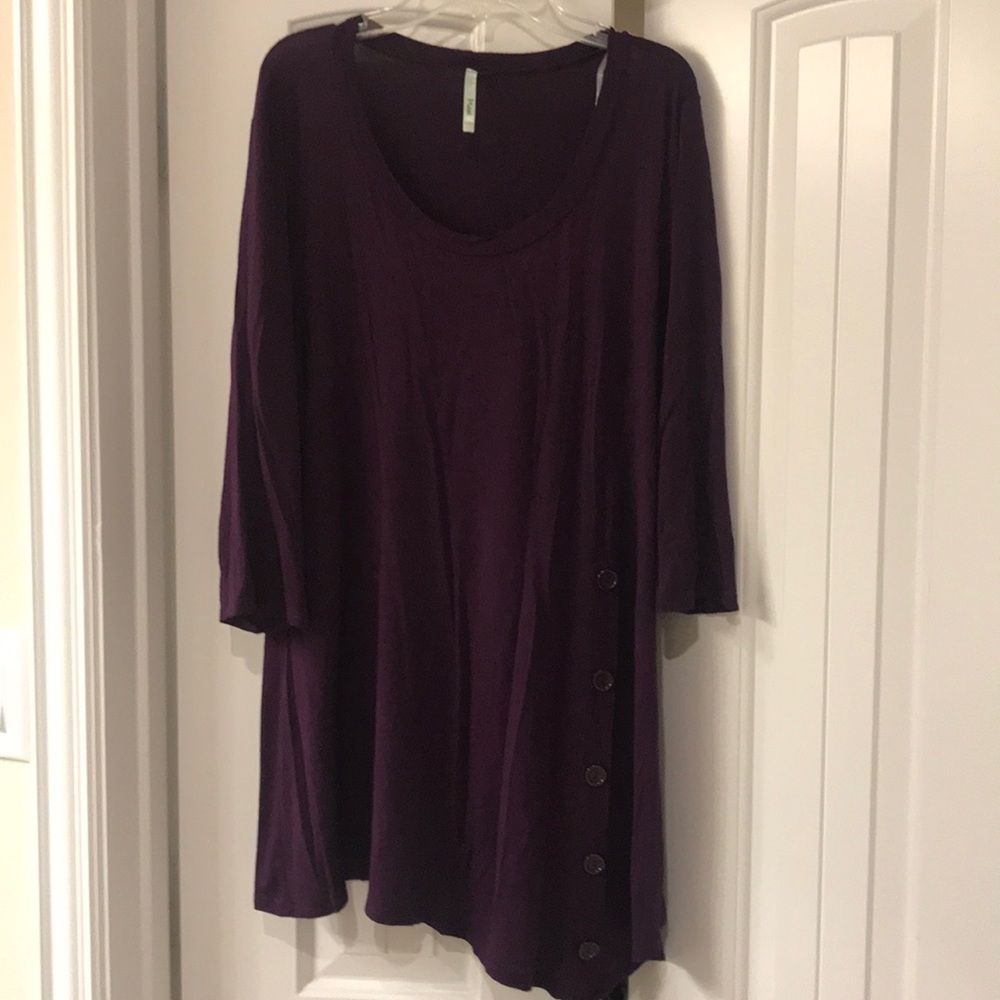 Tunic with bottom embellishments
